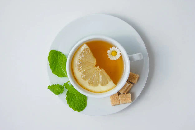 tea with lemon on top | Best green tea for weight loss